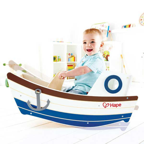 Boy in Wooden Teeter-Totter Boat