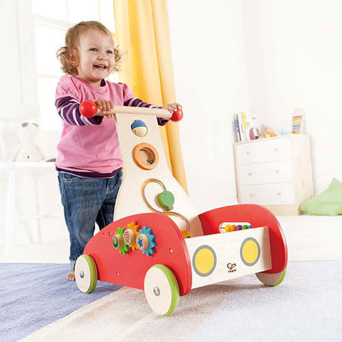 Girl Pushing Walking Cart Toy